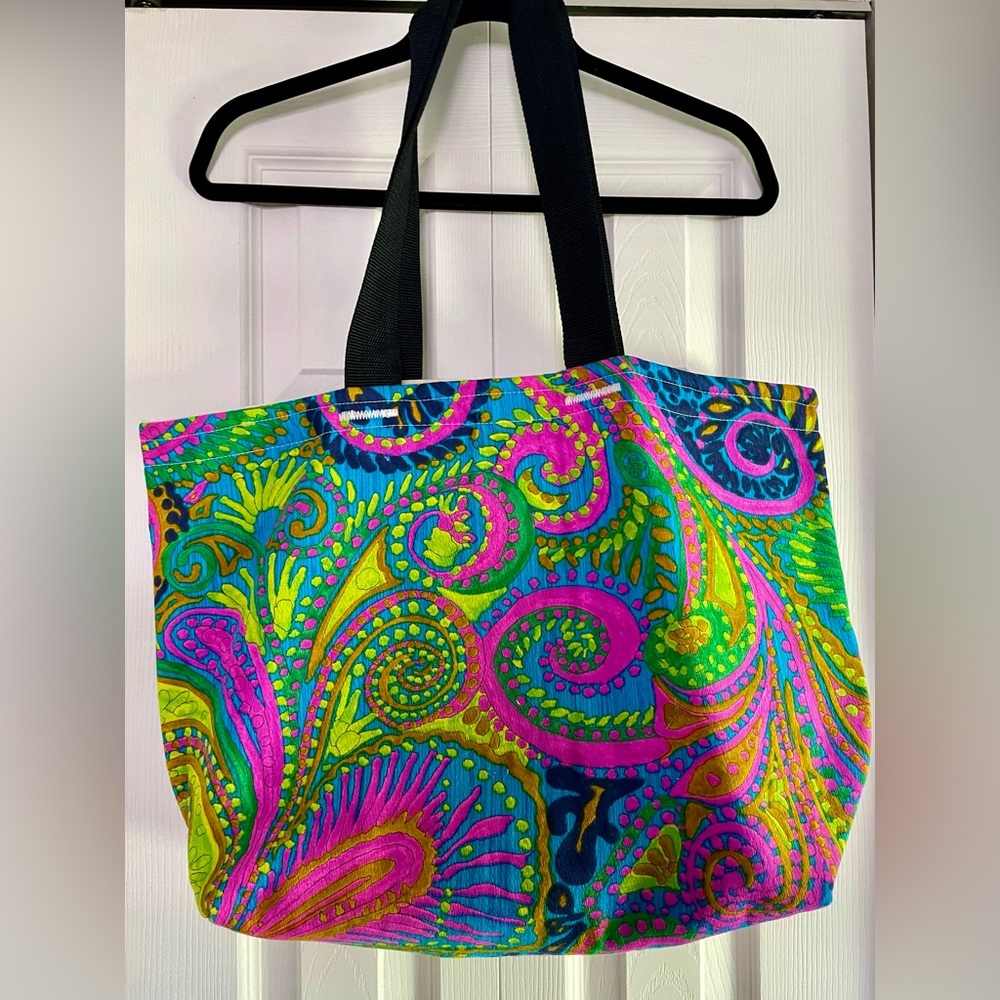 Brand new w/o tag. Repurposed Tote & clutch using gorgeous vintage material.